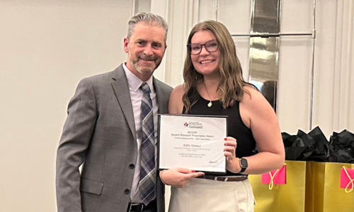 Abby with Dr. Mark Filliaggi, Vice Dean of Research, Dalhousie, receiving her award