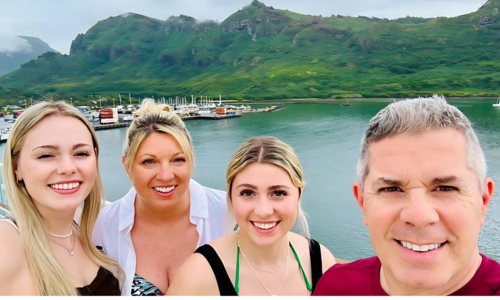 Lisa Stachow-Swales with her husband and two daughters on the waterfront